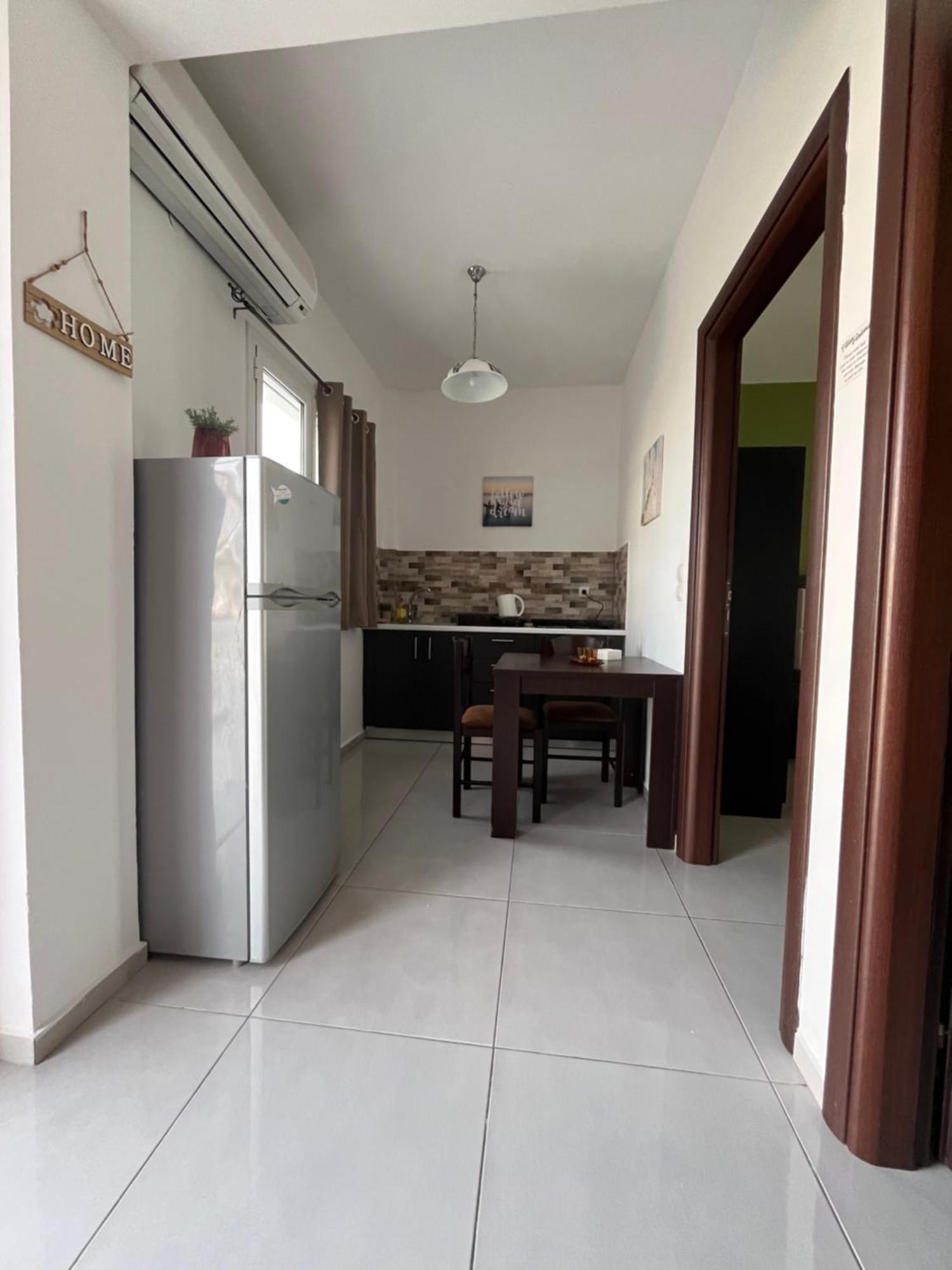Villa Antonis Deluxe Apartments 阿莫迪 外观 照片